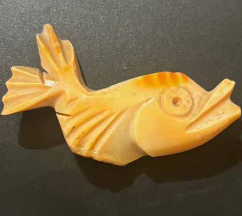 Carved conch shell fish - carved,